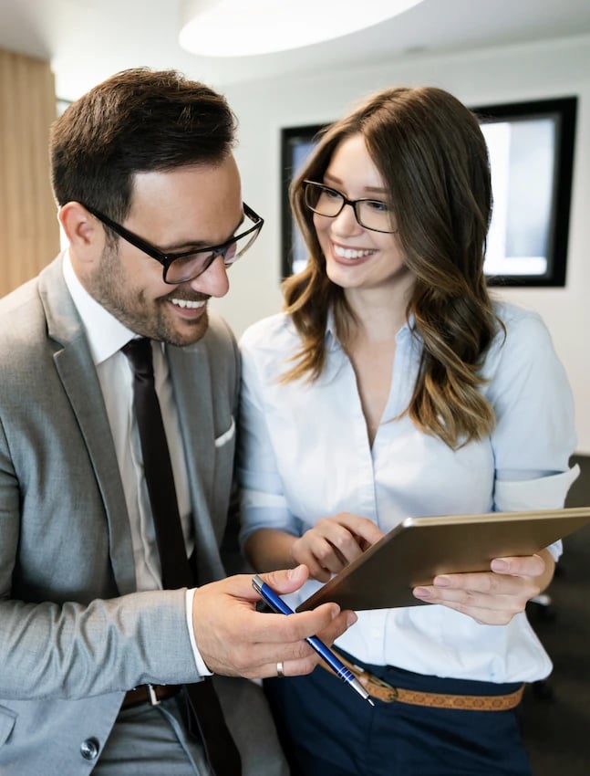 happy-business-colleagues-in-modern-office-using-t-2021-09-03-05-59-28-utc